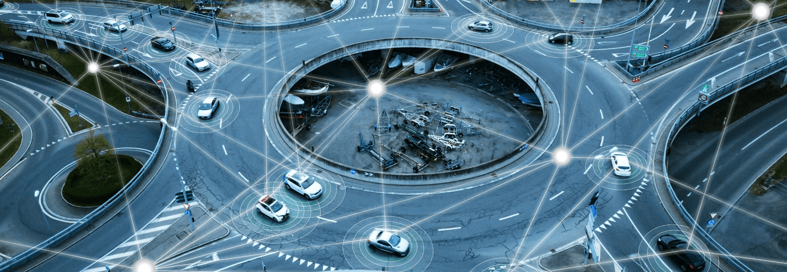 Aerial view of self driving cars in a traffic circle