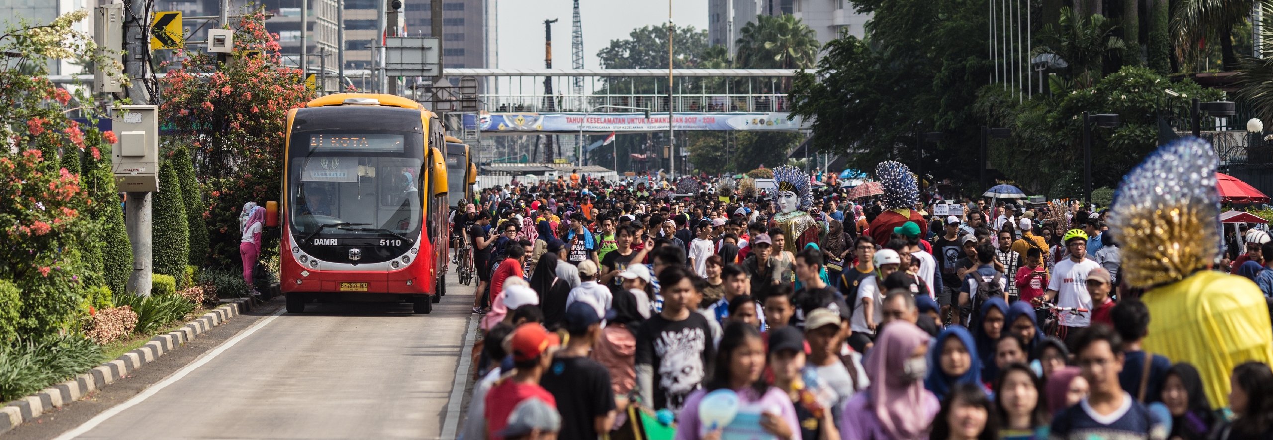 Bus and pedestrian crowd in Jakarta