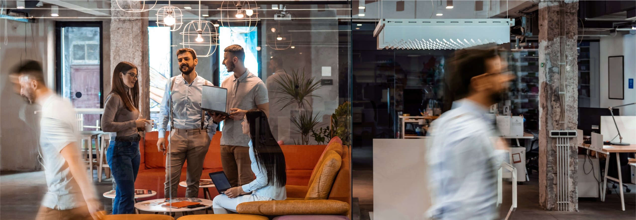 Business professionals collaborating in future workspace