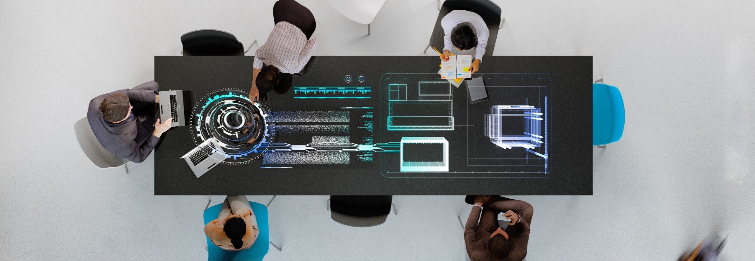 Aerial view of business professionals sitting at a conference table of the future