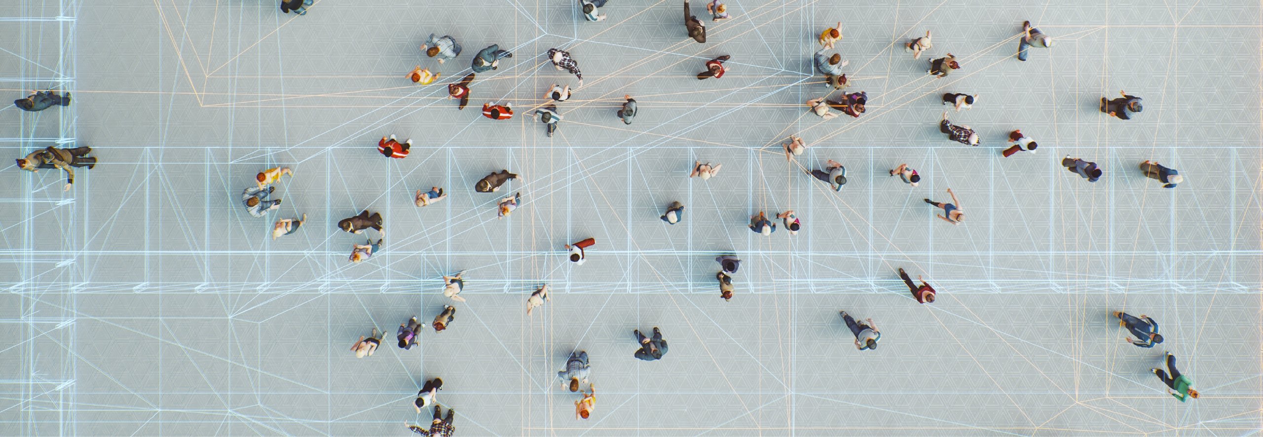 Group of people from aerial view connected with digital lines (metaphor for the Metaverse — playing on a digital world and inter connectivity)