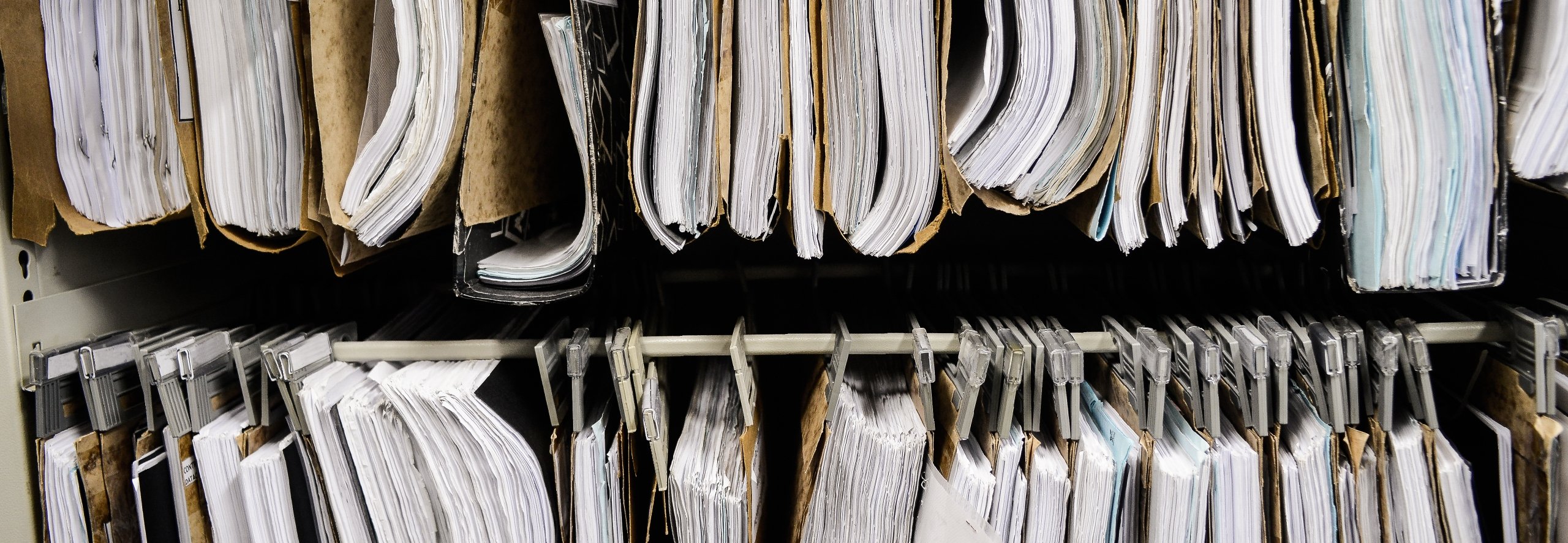 rows of hanging paper files