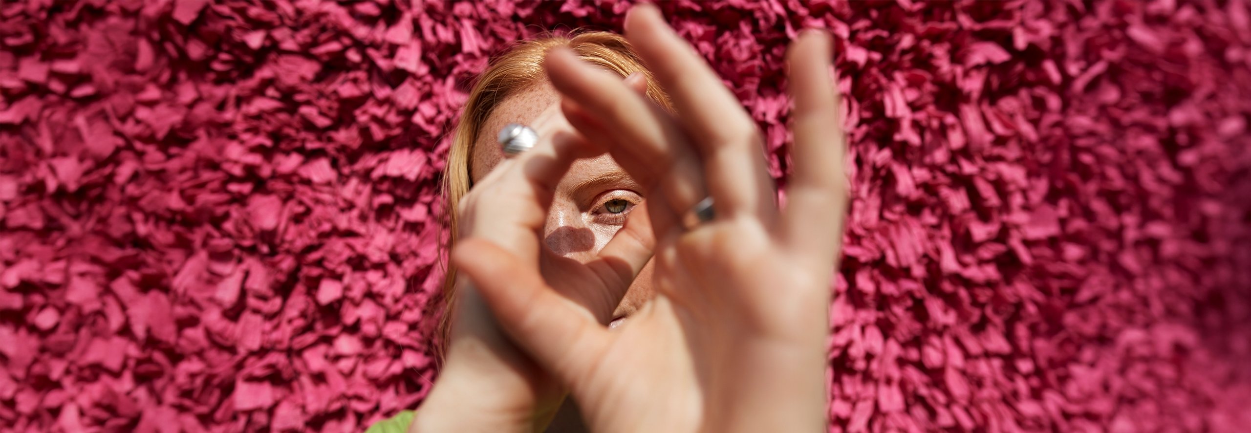woman looking through a funnel