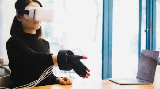 woman shaking hands in VR environment
